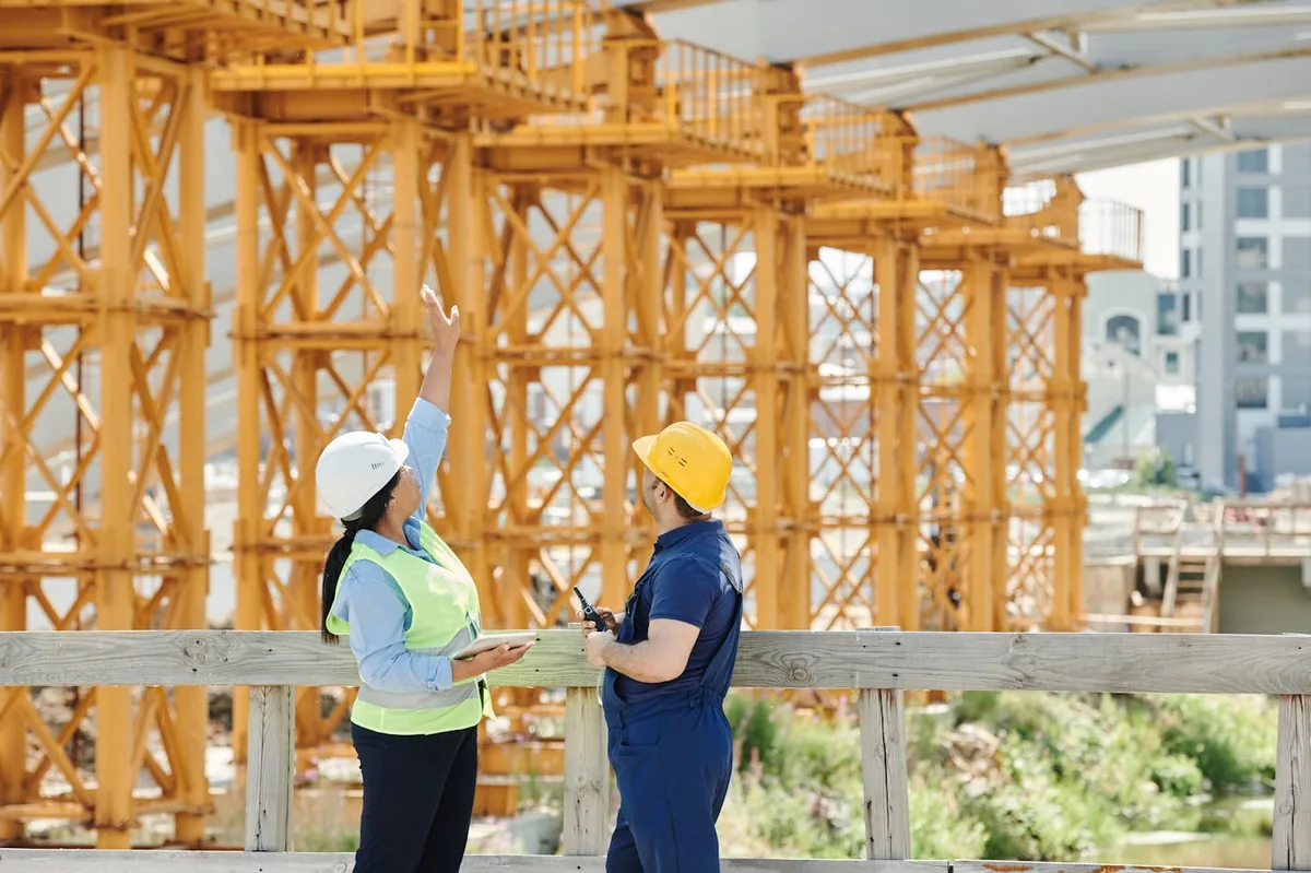 Project team coordinating on a commercial steel-frame jobsite